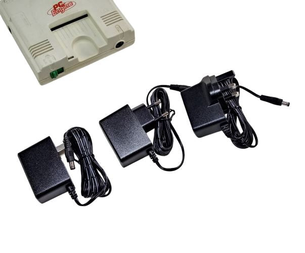 EU, US and UK plug regulated power supplies for NEC PC Engine, CoreGrafX 1 & 2